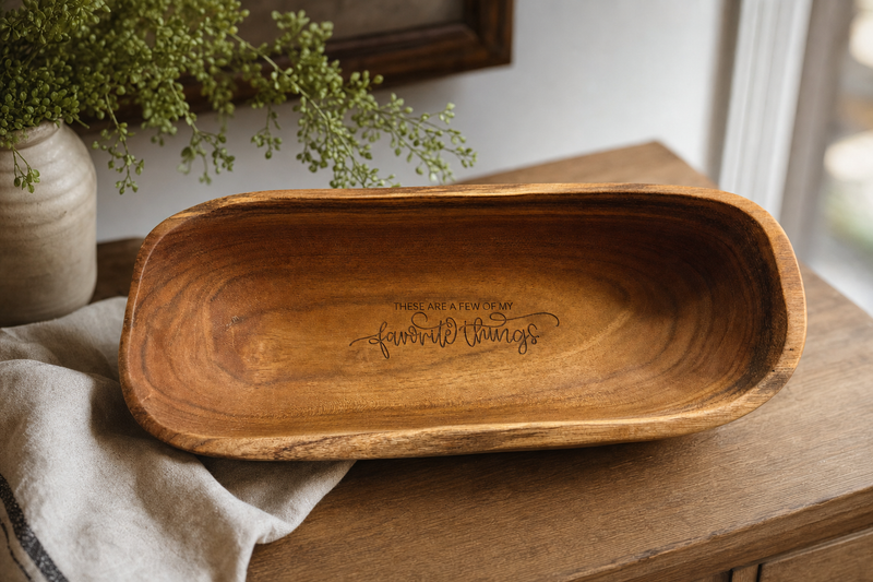 Favorite Things dough bowl styled on a farmhouse table with greenery