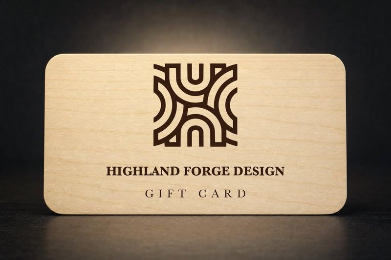 Highland Forge Design gift card — the HFD logo laser-engraved on a birch wood card
